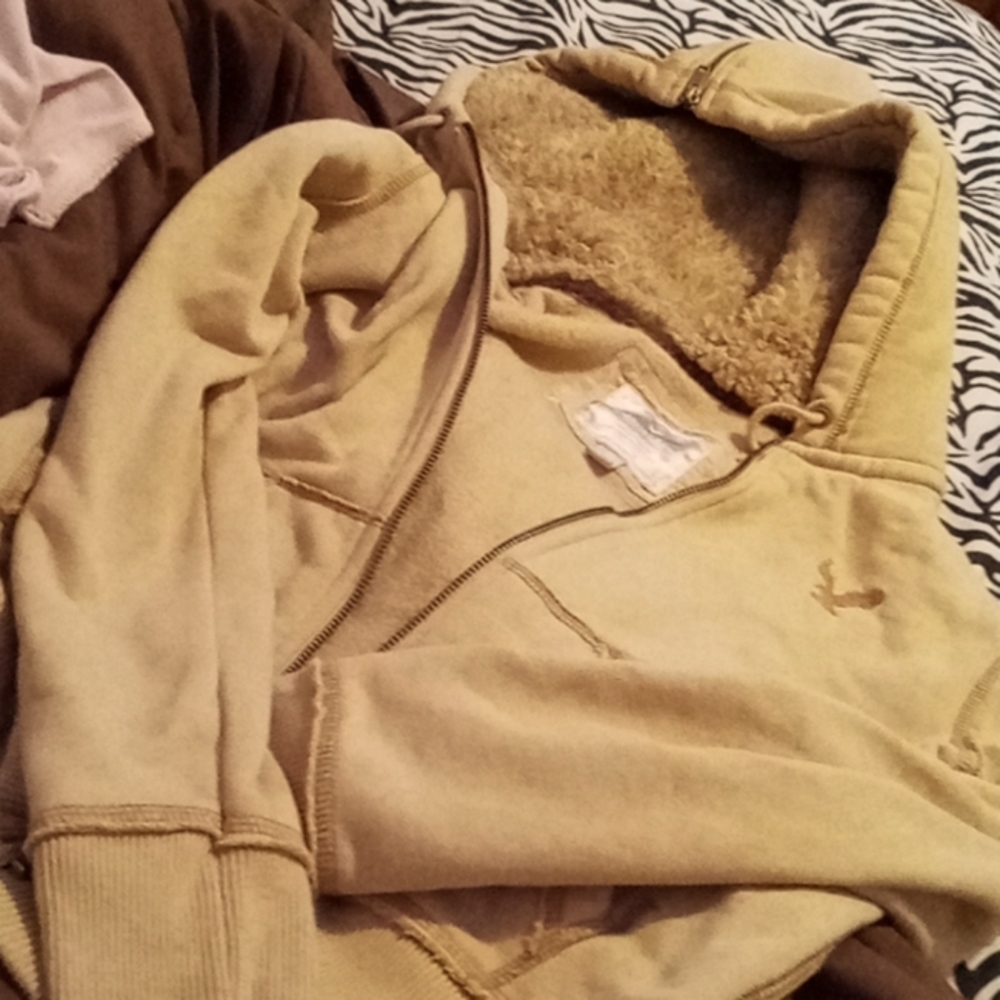 American eagle jacket size medium and tan color